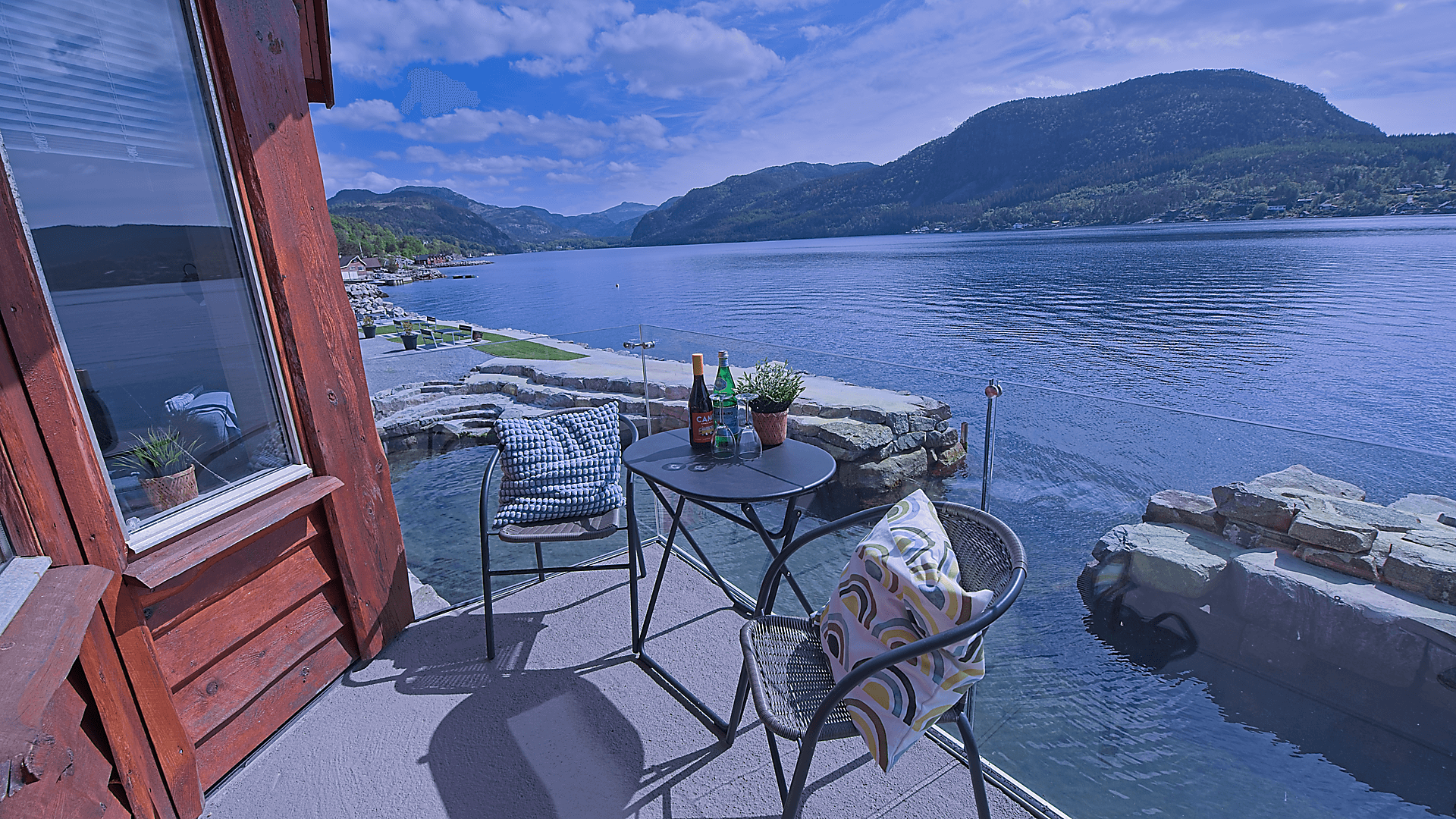 Aerial view of the Preikestolen Panorama apartments lined up along the fjord